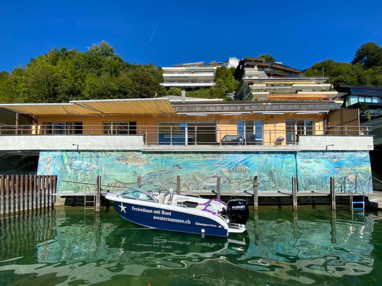 Ferienhaus Seestern mit Motorboot am Besuchersteg